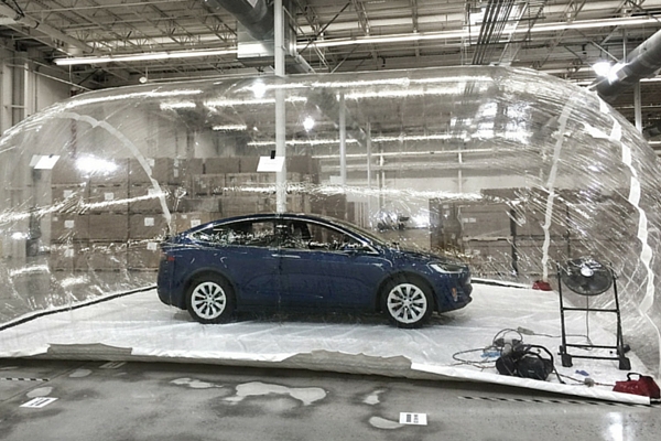 Tesla Model X inside pollution bubble