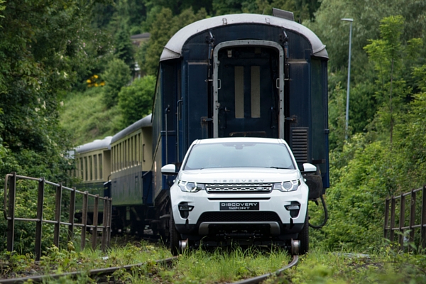 Land Rover Discovery Sport towing a train
